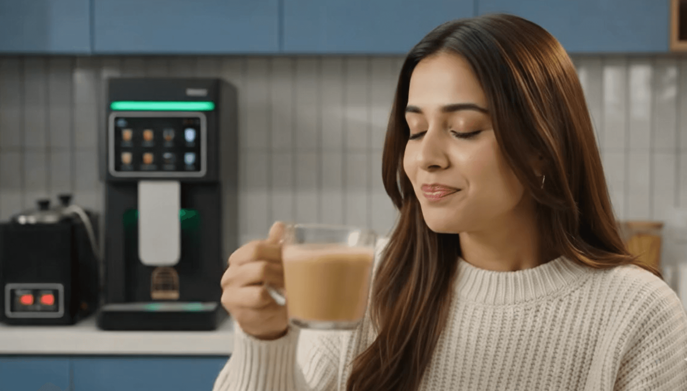 Enjoying a cup of chai from BrewTec in the office pantry