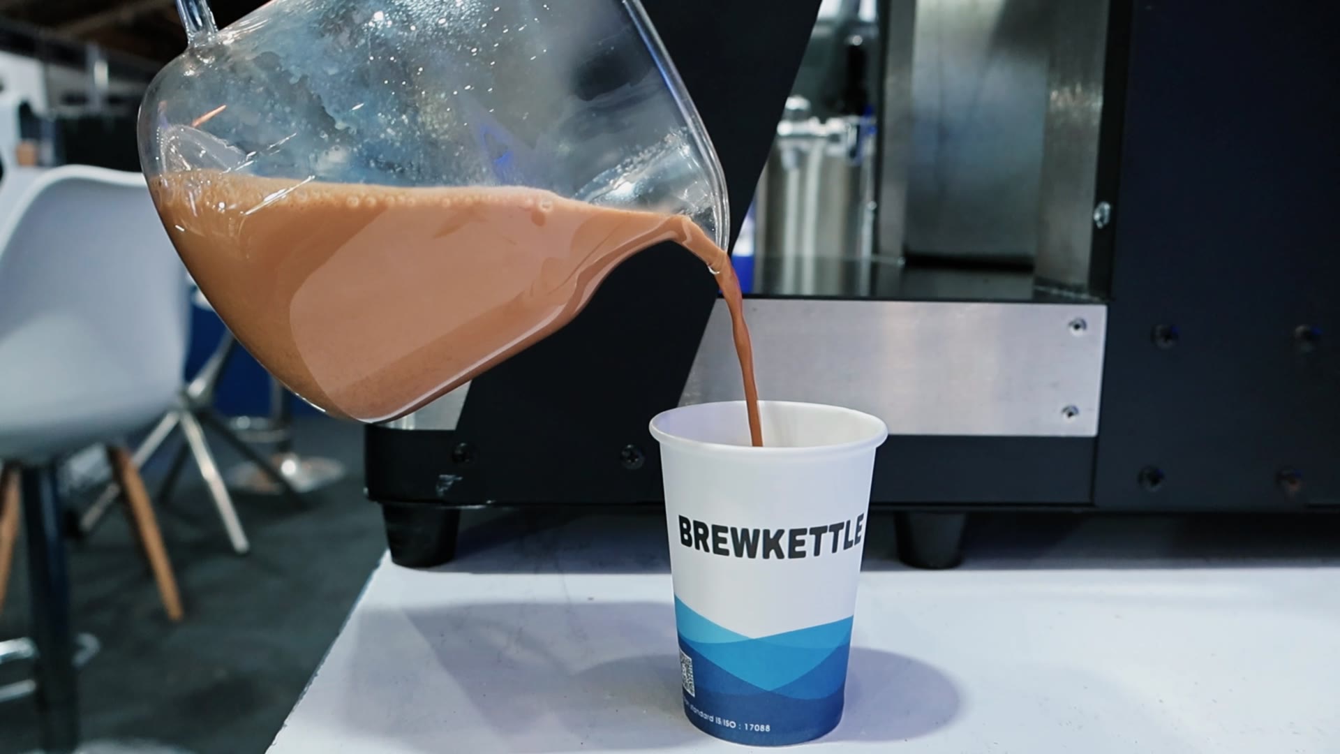 Chai poured from a BrewNex batch into a BrewKettle cup