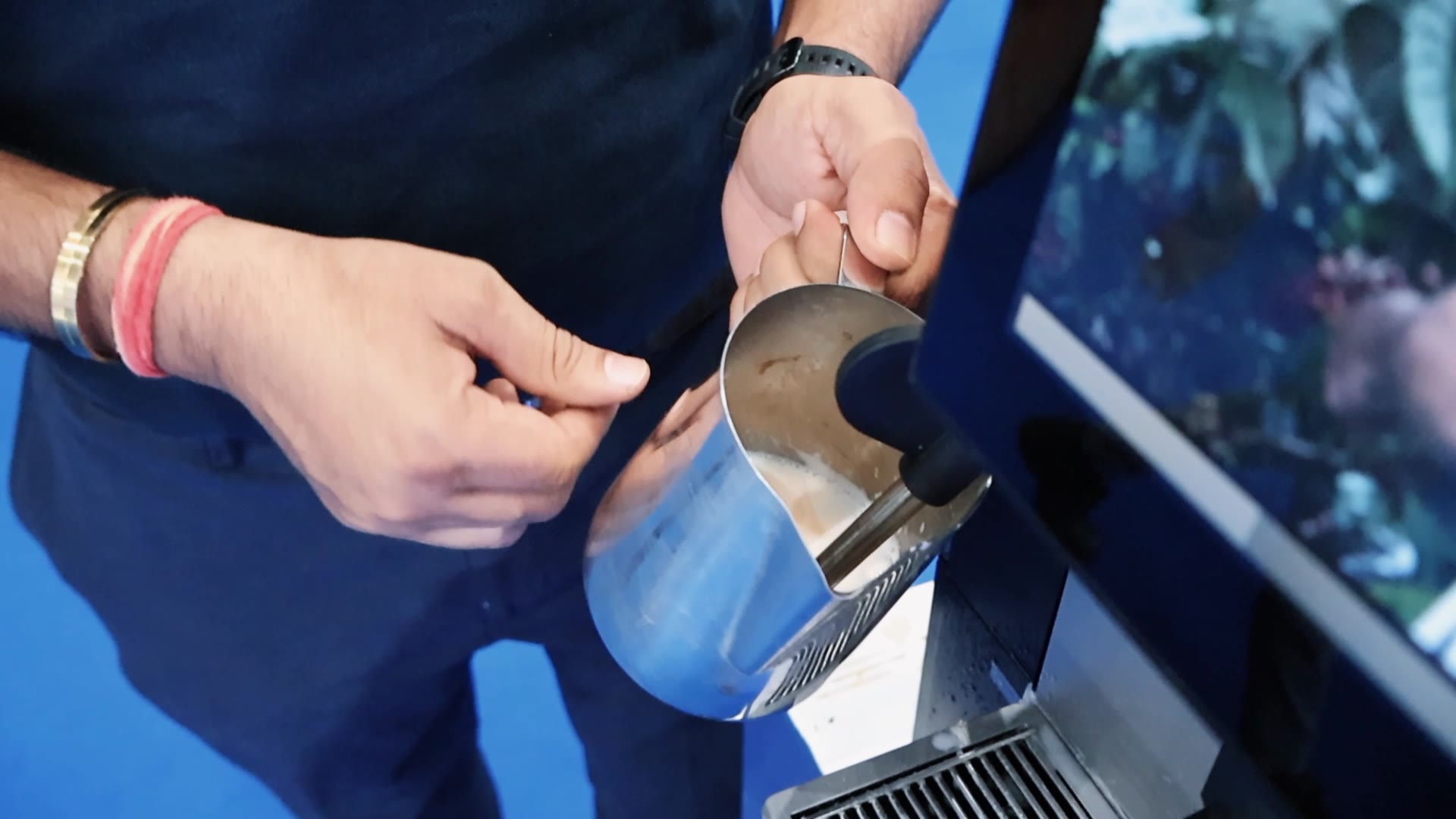 Milk steamed in a pitcher with the E60 Pro manual steam wand