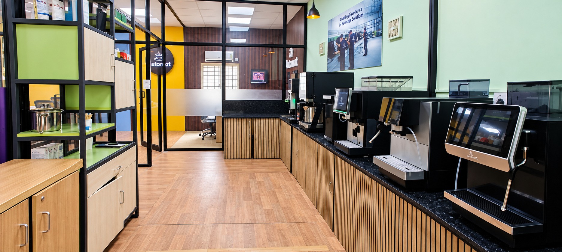 Illustration of a beverage showroom with tea and coffee machines on display