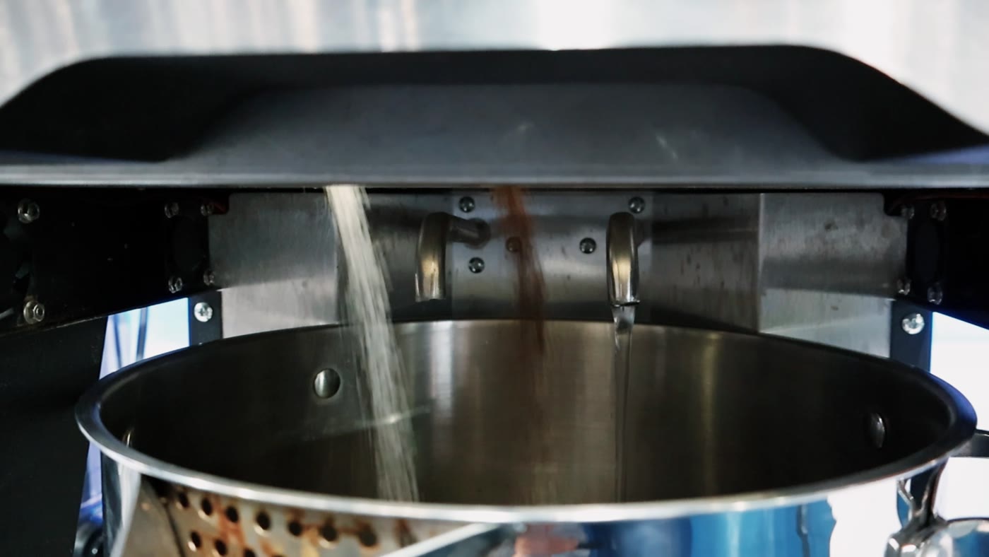 Sugar, tea and liquid dispensing into a BrewNex stainless-steel brewing pot