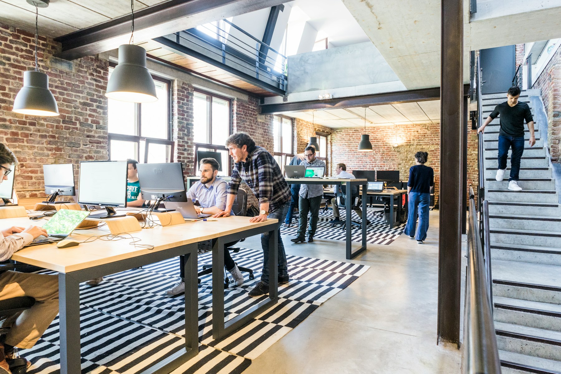 Open-plan office with people at work