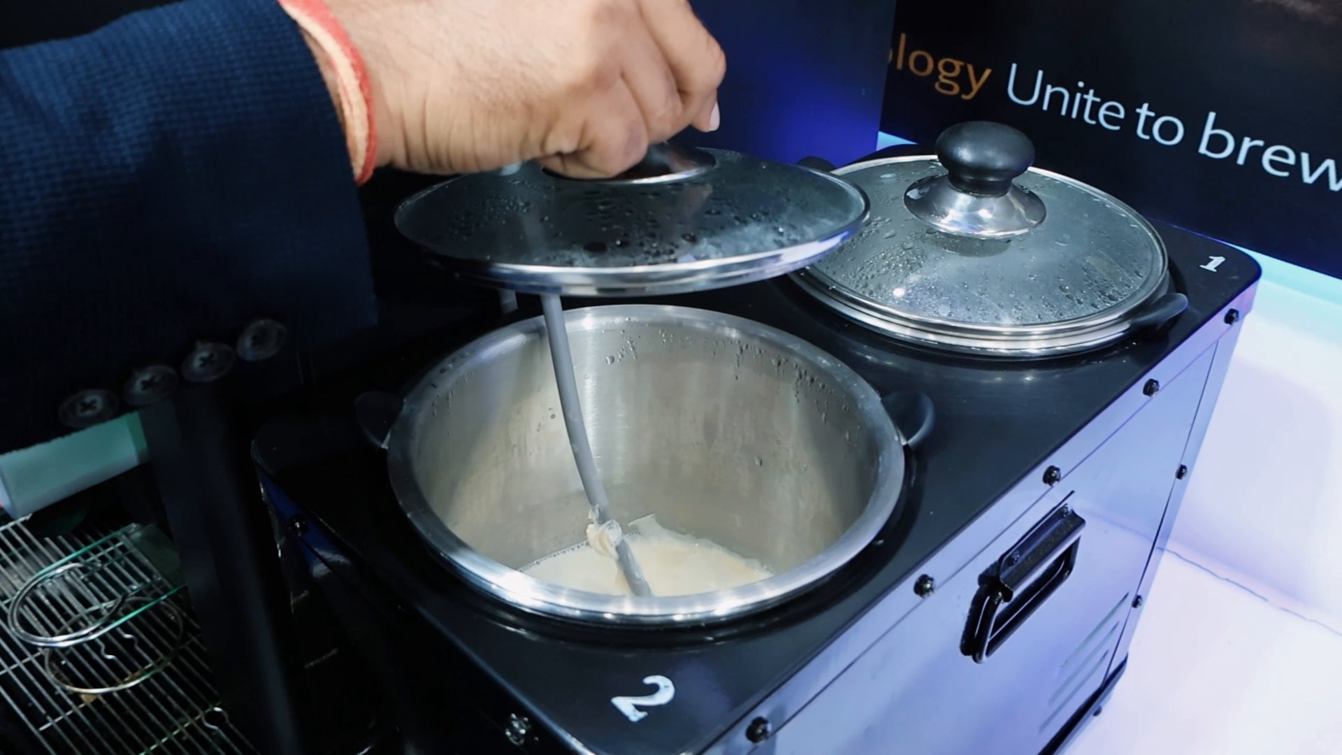 Fresh milk inside the chamber of the double-chamber milk boiler used with Brewtec