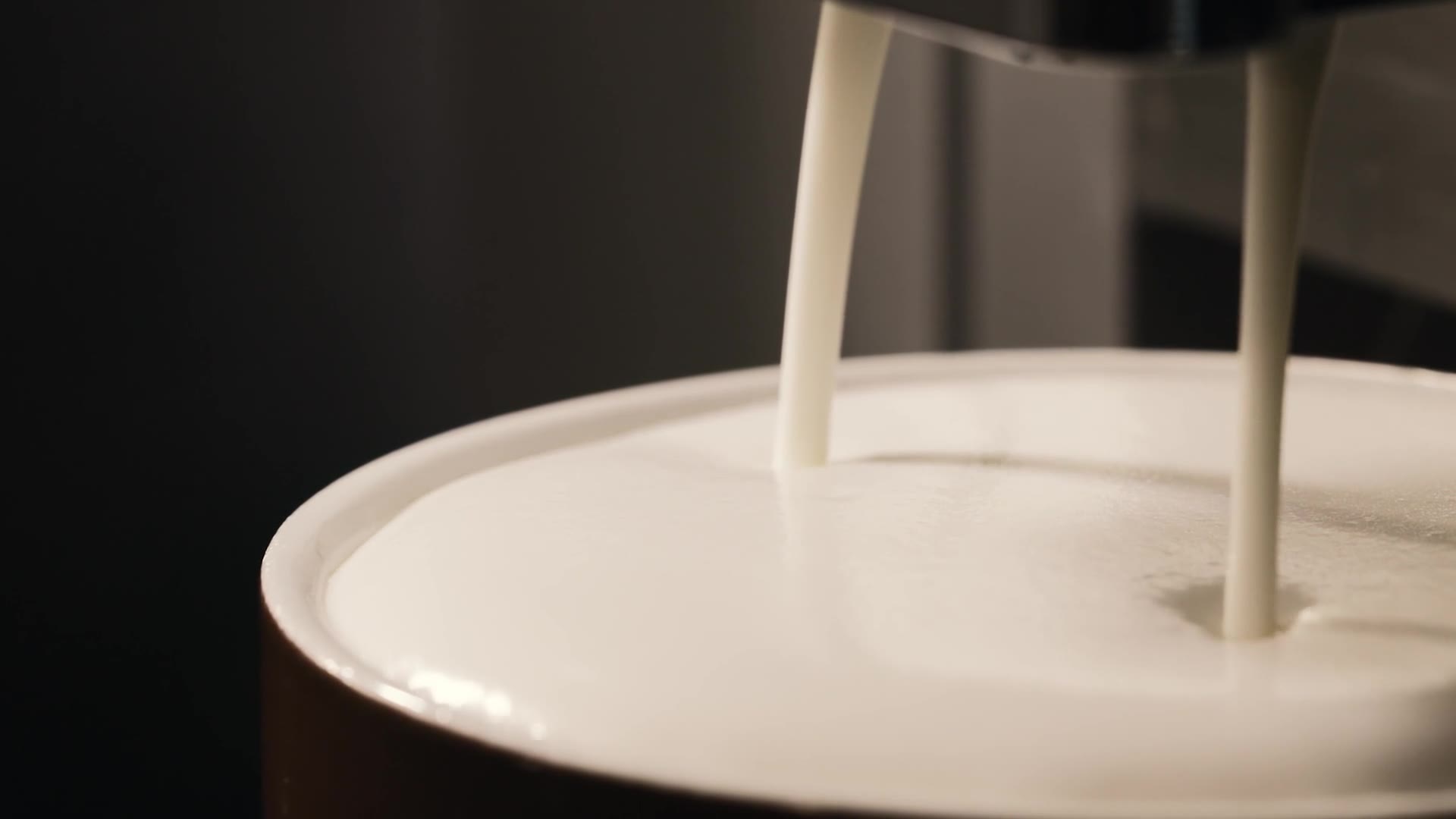 AT38 dispensing espresso and fresh milk